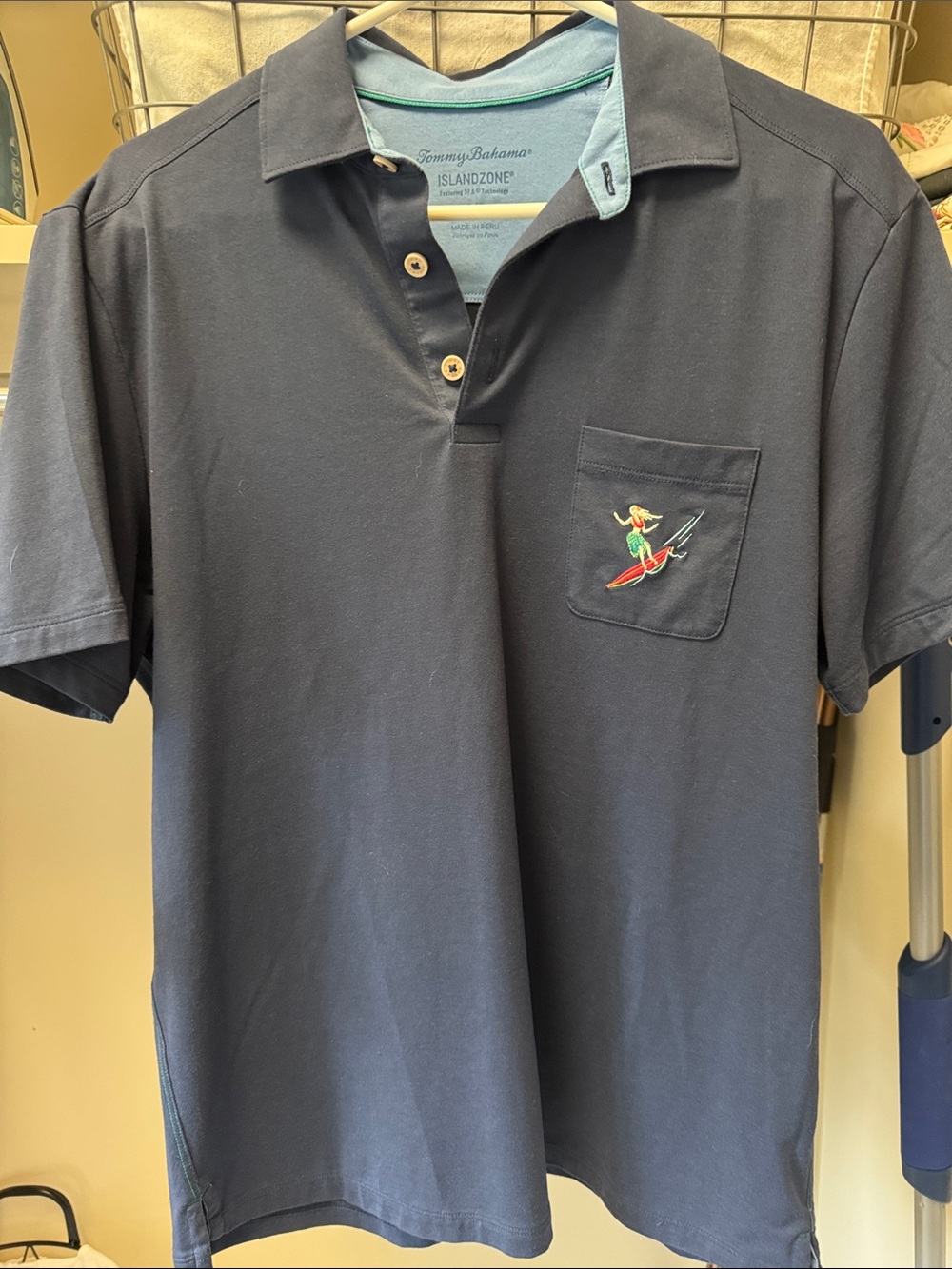 Tommy Bahama Navy Polo with Embroidered Surfer Pocket
